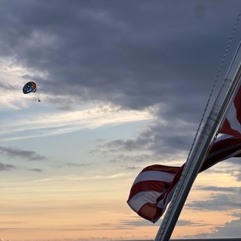 Star of Honolulu - an american flag flying in the wind - Seafood Near Me - Honolulu, Hawaii Star of Honolulu - an american flag flying in the wind - Seafood Near Me - Honolulu, Hawaii