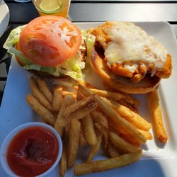 Farley Mac’s - Macs Chicken sandwich with hot honey sauce and a side of fries. It was very tasty! Next time I'll ask for.extra sauce because it was great.
