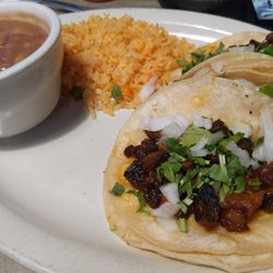 3 Tacos (pastor) with rice and beans