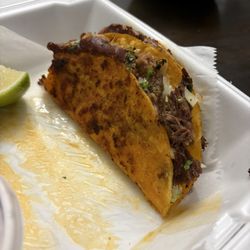 Jose's Tacos - Quesabirria tacos. Picture takes after I already ate 2 of the 4 in the order. These were perfect. Could have been on a food magazine