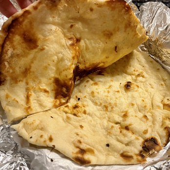 Highland's Indian Cuisine - Naan - Only $4 for this size - Indian Near Me - Highlands Ranch, Colorado Highland's Indian Cuisine - Naan - Only $4 for this size - Indian Near Me - Highlands Ranch, Colorado