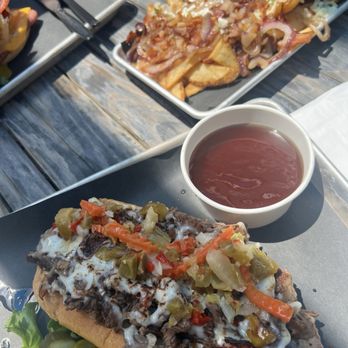 Coastal Haze Restaurant - Steak n cheese jardiniere sandwich and bacon fries - Burgers Near Me - Cape Carteret, North Carolina Coastal Haze Restaurant - Steak n cheese jardiniere sandwich and bacon fries - Burgers Near Me - Cape Carteret, North Carolina