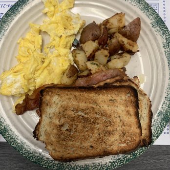 Rome Point Cafe - 'The Skipper' - Two eggs (scrambled), bacon, sausage, home fries and homemade rosemary toast - Breakfast & Brunch Near Me - North Kingstown, Rhode Island