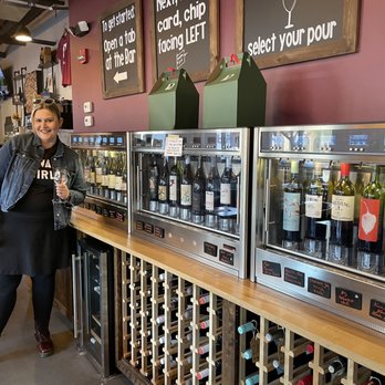 GenuWine Arizona - a woman in a wine shop - Wine Bars Near Me - Phoenix, Arizona GenuWine Arizona - a woman in a wine shop - Wine Bars Near Me - Phoenix, Arizona