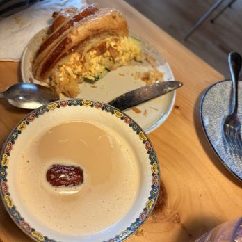 Momo Cafe - Po Cha / Tibetan Tea with jujube and Tamago (egg) croissant sandwich - Coffee & Tea Near Me - Minneapolis, Minnesota Momo Cafe - Po Cha / Tibetan Tea with jujube and Tamago (egg) croissant sandwich - Coffee & Tea Near Me - Minneapolis, Minnesota