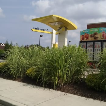 McDonald's - a yellow sign in front of a building - Fast Food Near Me - Georgetown, Delaware McDonald's - a yellow sign in front of a building - Fast Food Near Me - Georgetown, Delaware