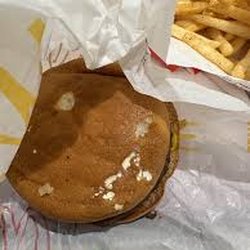 McDonald's - Moldy burger disgusting floors bathroom reaks staff rude 1 STAR
