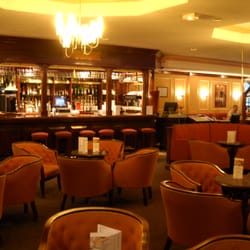 Mercure Caen Côte de Nacre - Lounge area adjacent to the restaurant.