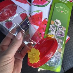 Dollar Tree - Hummingbird feeder, dish towel, dish mat, and thermometer.