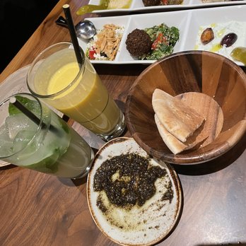 DishDash - Complimentary pita bread and the olive oil dip with za'atar.  Maza Sampler to taste a variety of dips.  Just heavenly! - Middle Eastern Near Me - Sunnyvale, California