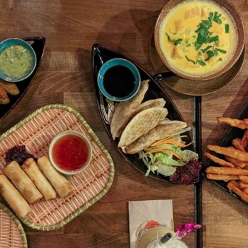 Viet Village - A variety of vegetarian starters. Breaded avocado, mini springrolls, veggie gyoza, pumpkin soup & sweet potato fries - Vietnamese Near Me - Cologne, NW
