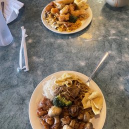 two plates of food on a table two plates of food on a table
