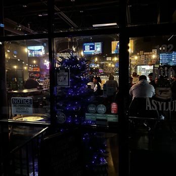Hop Asylum - Outside looking in holiday decor - Beer Bar Near Me - Brentwood, California Hop Asylum - Outside looking in holiday decor - Beer Bar Near Me - Brentwood, California