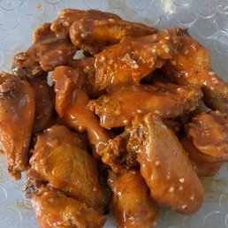 HOT Buffalo wings with extra sauce. HOT Buffalo wings with extra sauce.