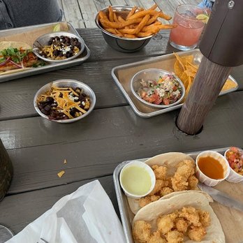 The Wyld Dock Bar - Shrimp tacos (pico and sauces on the side), fish tacos, fries, and ceviche - New American Near Me - Savannah, Georgia The Wyld Dock Bar - Shrimp tacos (pico and sauces on the side), fish tacos, fries, and ceviche - New American Near Me - Savannah, Georgia