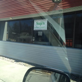 Suji's Indian Grocery - a reflection in a car window - Grocery Near Me - Lincoln, Nebraska Suji's Indian Grocery - a reflection in a car window - Grocery Near Me - Lincoln, Nebraska