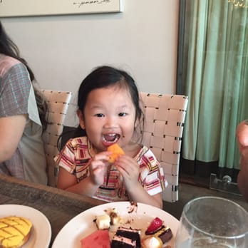 Caracol - My little cousin enjoying the fresh fruit and dessert table. - Seafood Near Me - Houston, Texas Caracol - My little cousin enjoying the fresh fruit and dessert table. - Seafood Near Me - Houston, Texas