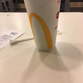 McDonald's - a cup of coffee on a table - Burgers Near Me - Kingston, New York McDonald's - a cup of coffee on a table - Burgers Near Me - Kingston, New York