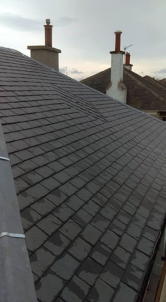 Slide of Quail Hill Roofing