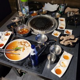 a variety of dishes on a table a variety of dishes on a table