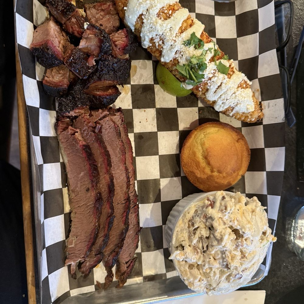 Brisket, burnt ends, potato salad, elote and cornbread. Brisket, burnt ends, potato salad, elote and cornbread.