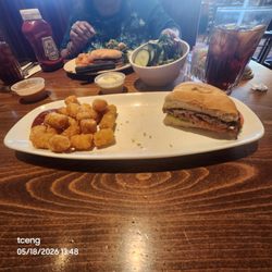 Traditions Dining - Half burger, half order tater tots, small salad. ice tea.