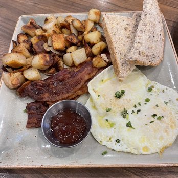 First Watch - Best bacon ever! And that bread was insanely good - bought a loaf to take home. Potatoes were perfectly seasoned also - American Near Me - Jacksonville, Florida