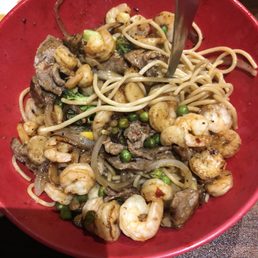 a bowl of noodles and shrimp a bowl of noodles and shrimp