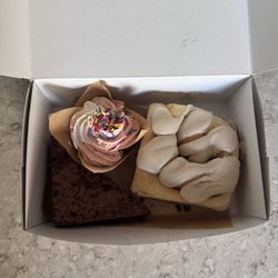 Hopkins Baking Company - Nice bundle of cinnamon roll, chocolate bar, and Neapolitan cupcake