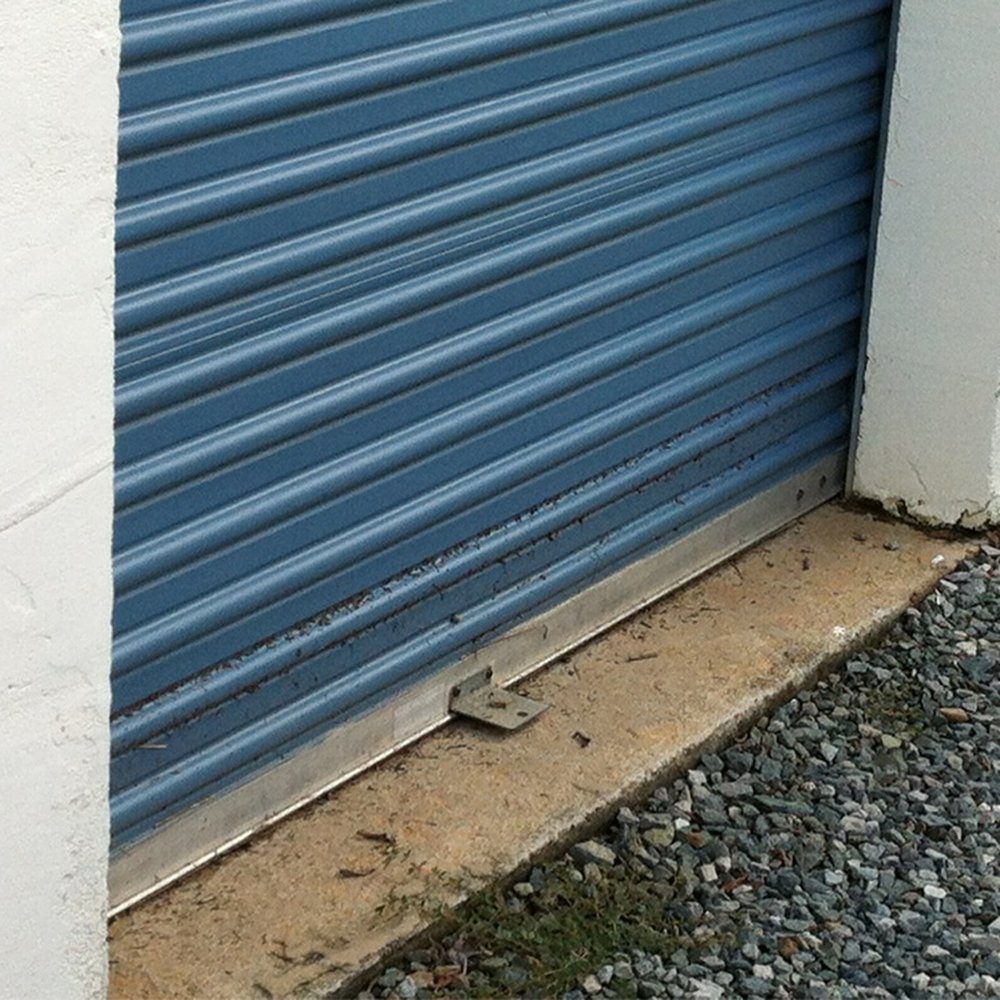 Chapel Hill Self Storage - Water line on unit, 7/3/13. Most outdoor drive up units flooded 4-8 inches of water - Self Storage Near Me - Chapel Hill, North Carolina Chapel Hill Self Storage - Water line on unit, 7/3/13. Most outdoor drive up units flooded 4-8 inches of water - Self Storage Near Me - Chapel Hill, North Carolina