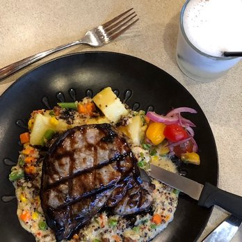 Mayta's Peruvian Cuisine - Grilled Pork Chop with Inka Quinoa Stew from the specials menu, along with a Pisco Sour. - Peruvian Near Me - Frederick, Maryland Mayta's Peruvian Cuisine - Grilled Pork Chop with Inka Quinoa Stew from the specials menu, along with a Pisco Sour. - Peruvian Near Me - Frederick, Maryland