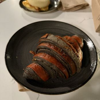 The French Guys - "Spooky croissant" (white chocolate pumpkin) delicious - Bakeries Near Me - Seattle, Washington