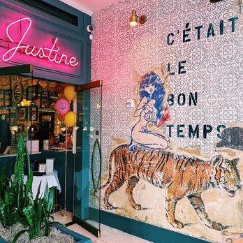 Justine - The entrance is so aesthetically pleasing and the outdoor patio is just to the left. - French Near Me - New Orleans, Louisiana Justine - The entrance is so aesthetically pleasing and the outdoor patio is just to the left. - French Near Me - New Orleans, Louisiana