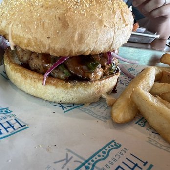 The Deck - Shrimp burger ! Way too much teriyaki sauce otherwise it's yummy! - New American Near Me - Tybee Island, Georgia