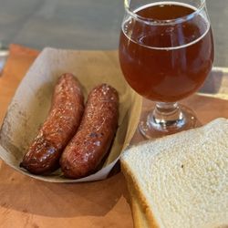 Nueces Brewing - Jalapeño and cheese / garlic sausages with a June baby IPA