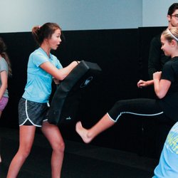 House of Combat - Our Level 2 kids Krav Maga class practice their front kick.