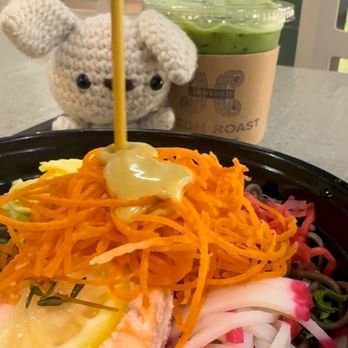 OlenaHi - Drizzling on the 'Ōlena sesame dressing - Salad Near Me - Honolulu, Hawaii