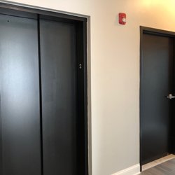 Partition Wine and Liquors - Elevator ADA and restrooms