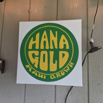 Hana Gold - a sign on the wall of a restaurant - Chocolatiers & Shops Near Me - Hana, Hawaii