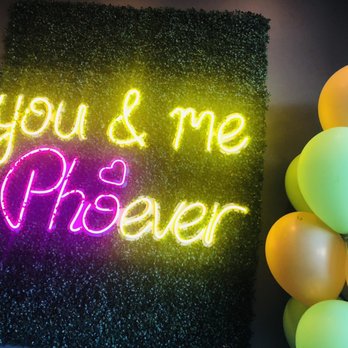 Pho Pham - a neon sign and balloons - Vietnamese Near Me - Calgary, Alberta