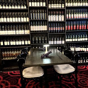 Cheesetique - Inside, back wine room. Gorgeous atmosphere for dinner time. - Cheese Shops Near Me - Alexandria, Virginia