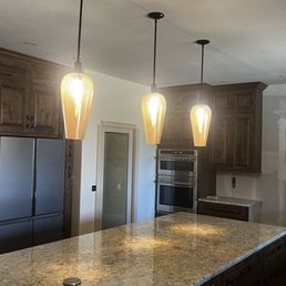 Crackle glass pendant lights for our newly remodeled kitchen.