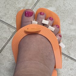 Harwich Nails - Pedicure complete with pink toes for the summer.