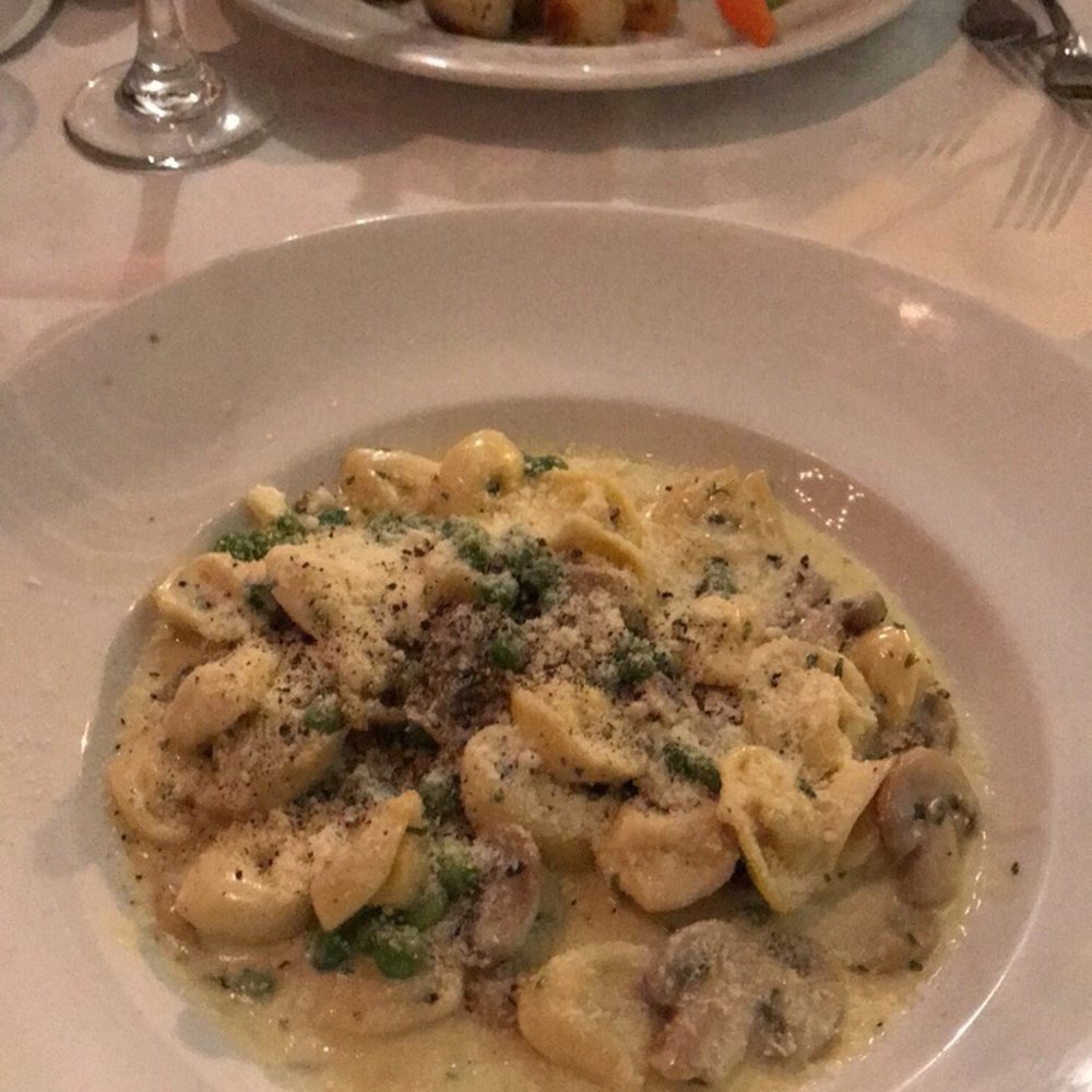 Donatello Restaurant - Stuffed Tortellini with cheese and cream mushroom sauce + the date's tender veil chop with vegetables - Italian Near Me - Toronto, Ontario Donatello Restaurant - Stuffed Tortellini with cheese and cream mushroom sauce + the date's tender veil chop with vegetables - Italian Near Me - Toronto, Ontario
