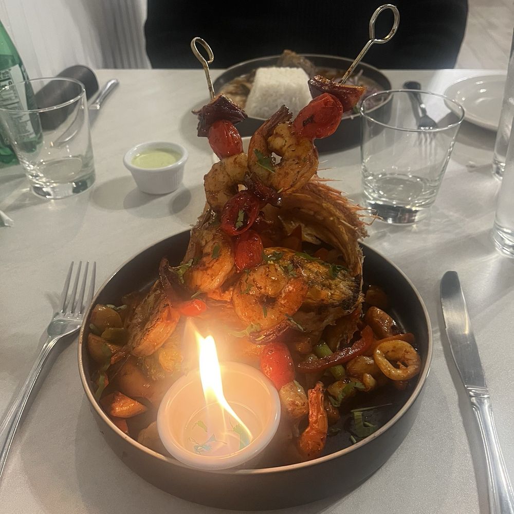 Ceviche House Mi Peru - Grilled whole snapper with shrimp , calamari and veggies. - Peruvian Near Me - Red Bank, New Jersey Ceviche House Mi Peru - Grilled whole snapper with shrimp , calamari and veggies. - Peruvian Near Me - Red Bank, New Jersey