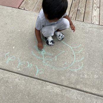 Daycare On Rives - Having fun with chalk - Child Care & Day Care Near Me - Downey, California Daycare On Rives - Having fun with chalk - Child Care & Day Care Near Me - Downey, California