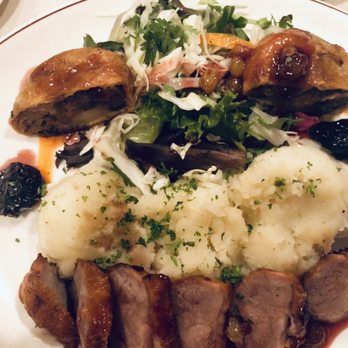 Russian Tea Time - Roasted duck Breast with duck strudel. Potato, poached prunes, raisins, Madeira wine sauce. This was phenomenal! - Russian Near Me - Chicago, Illinois Russian Tea Time - Roasted duck Breast with duck strudel. Potato, poached prunes, raisins, Madeira wine sauce. This was phenomenal! - Russian Near Me - Chicago, Illinois