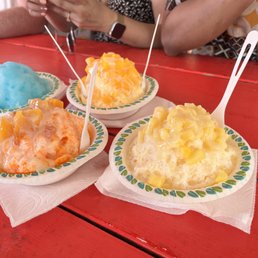Top left: blue coconut, bottom left: peach, top middle: mango, bottom right: pineapple Top left: blue coconut, bottom left: peach, top middle: mango, bottom right: pineapple