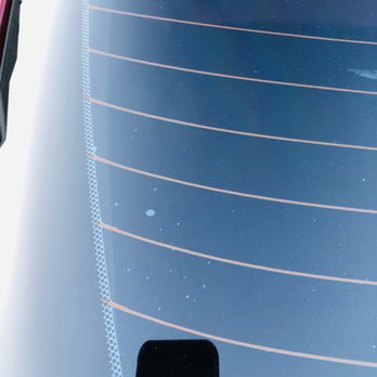 Executive Tint - one of many of the bubbles in the back window. - Car Window Tinting Near Me - Houston, Texas Executive Tint - one of many of the bubbles in the back window. - Car Window Tinting Near Me - Houston, Texas