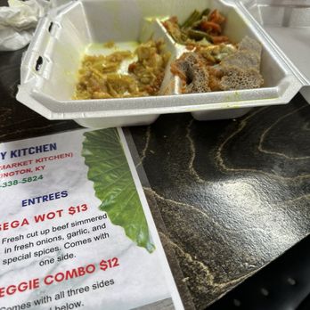 Ethiopian Family Kitchen - Veggies combo. Photo after halfway through.  Excellent - Ethiopian Near Me - Lexington, Kentucky